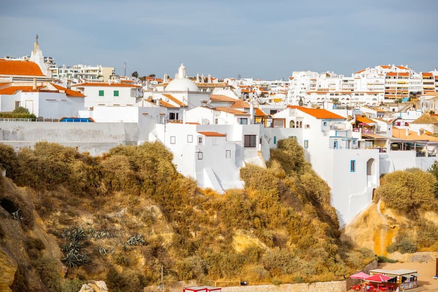 beautiful white houses on the rocks in Albufeira